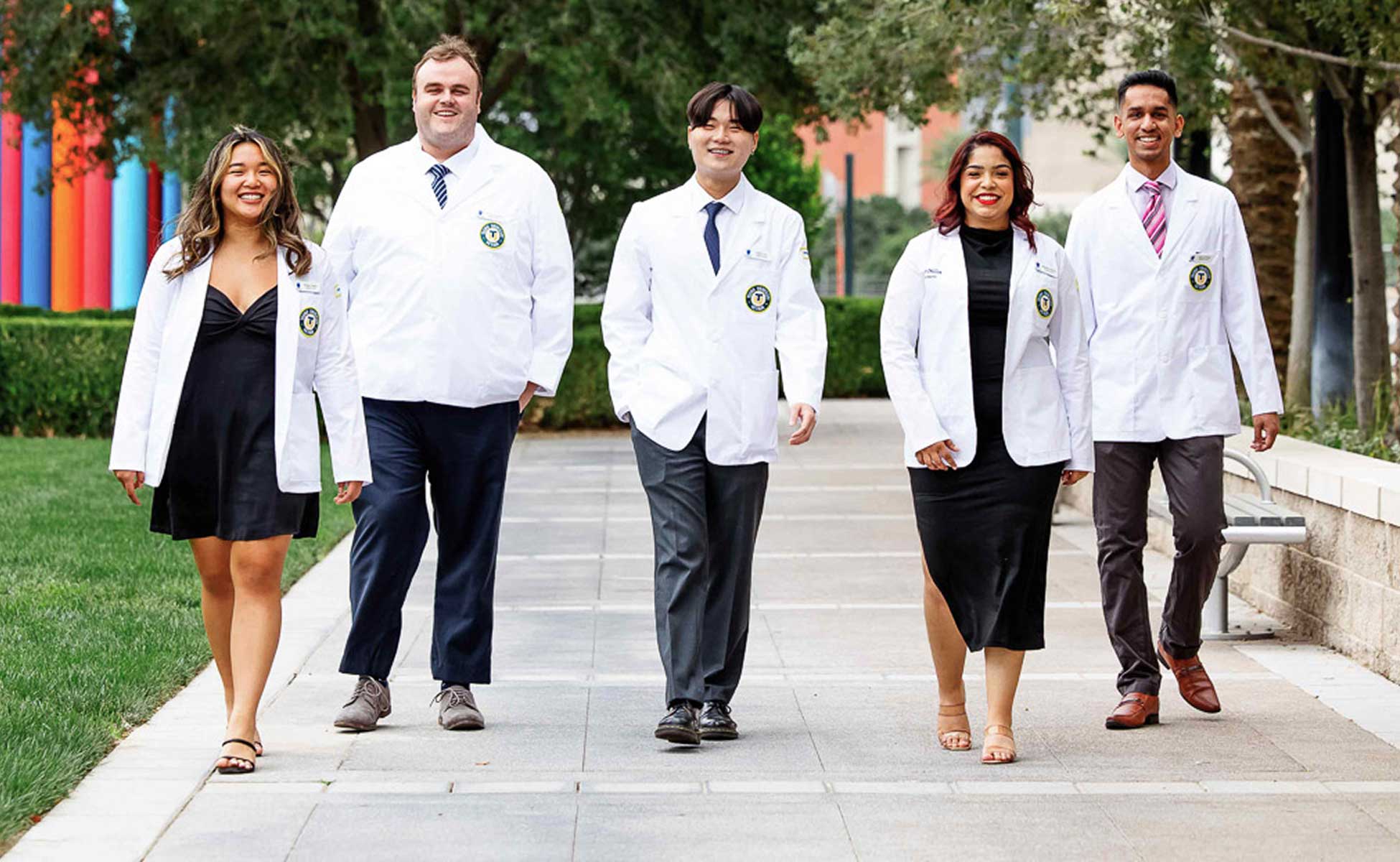 TUN students walking outside on campus