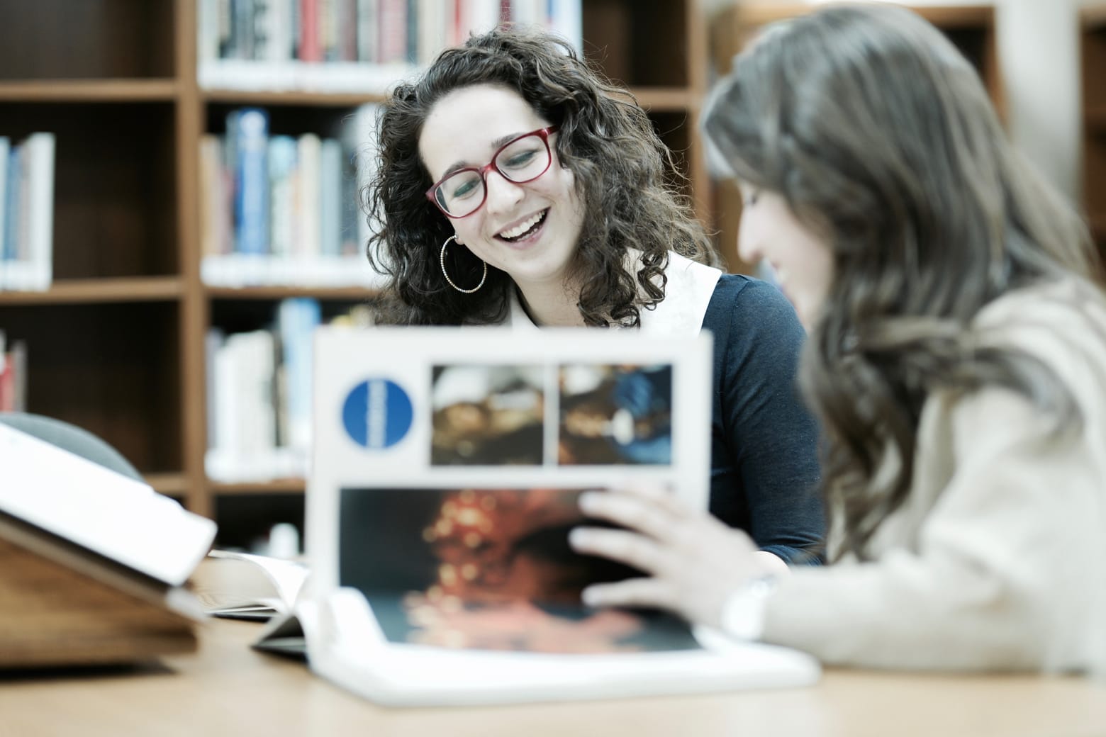 students reading in library