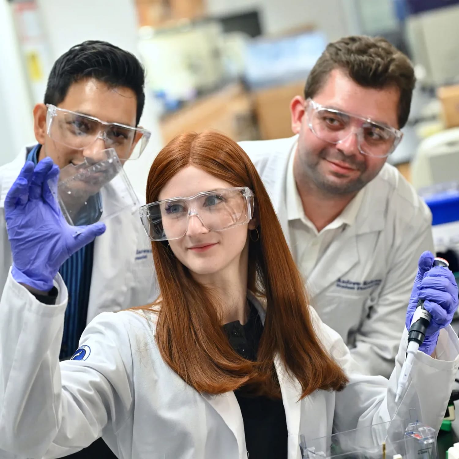 Tcop researchers in a pharmaceutical lab