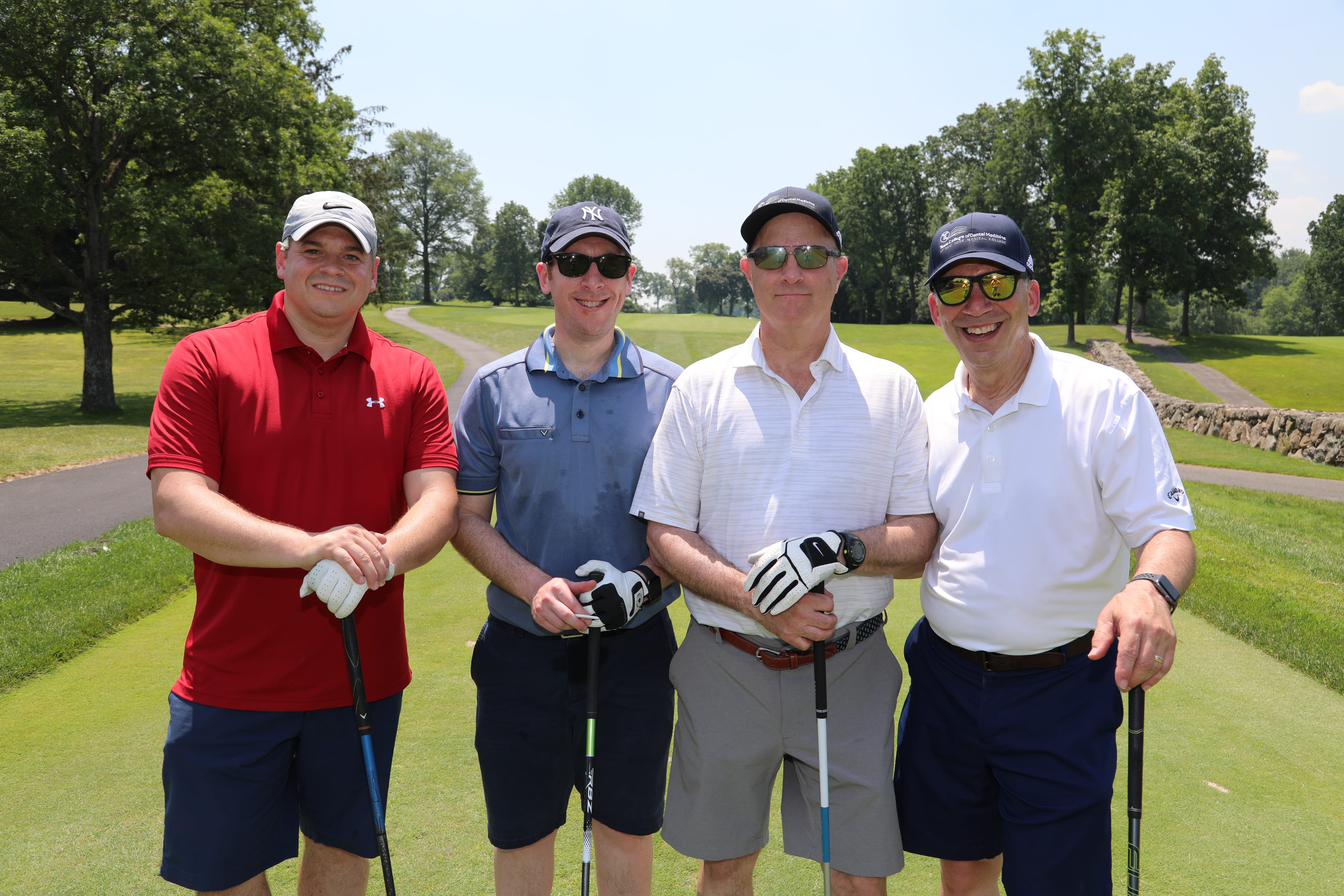 group shot of golfers on course