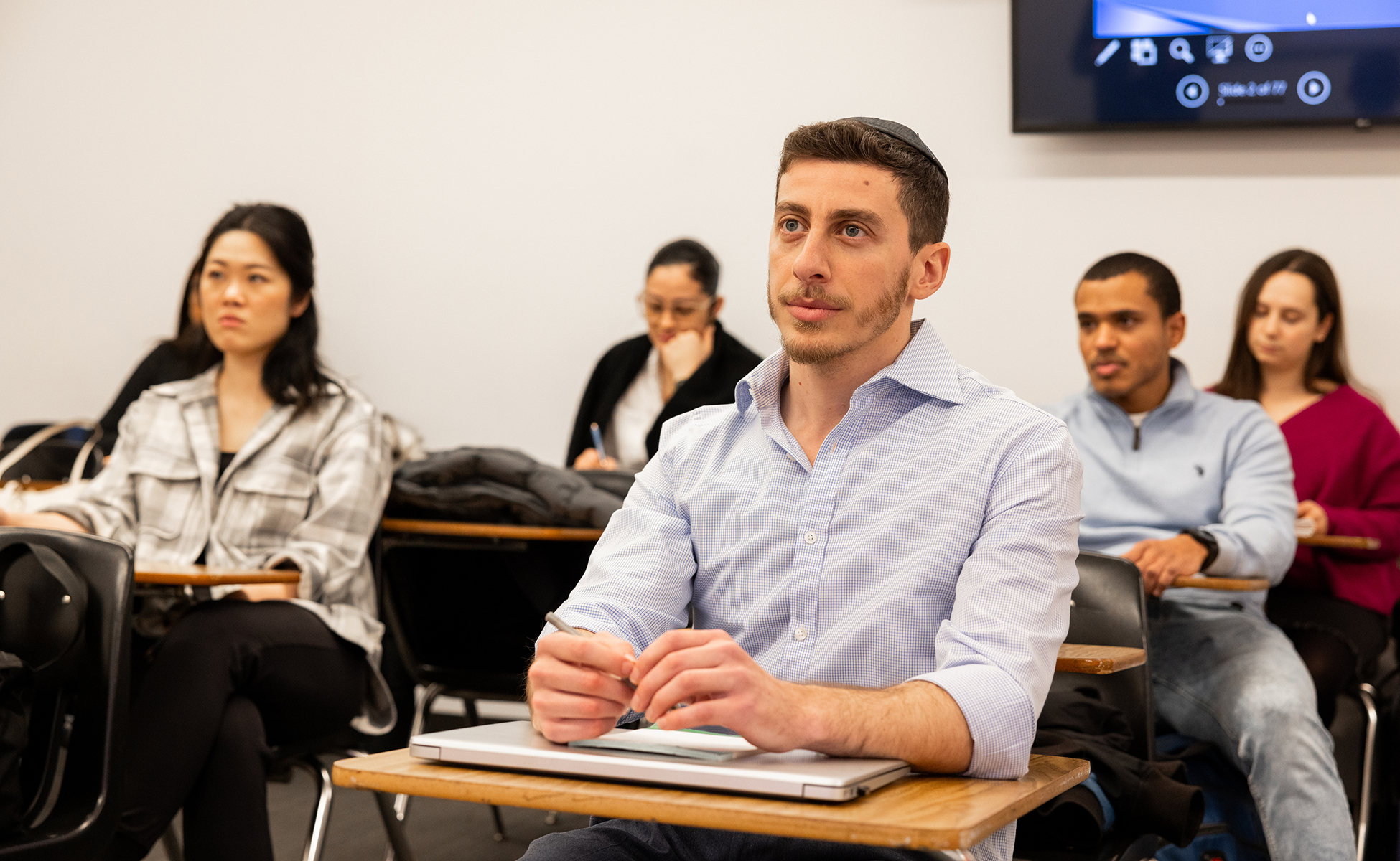 Students sitting at desks during class