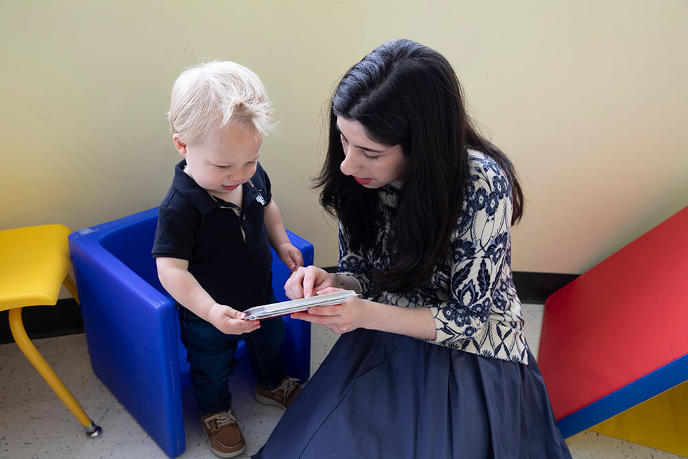 speech therapist working with child