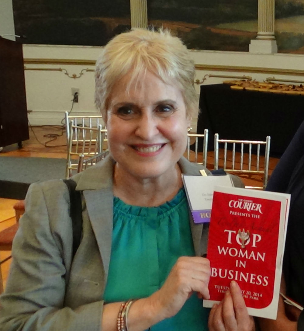 Dr. Sabra Brock, Interim Dean of Touro’s Graduate School of Business, with “Top Woman in Business” Award from Queen’s Courier 