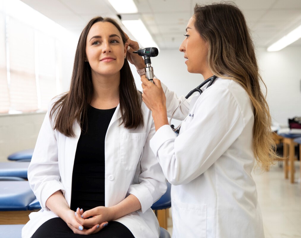 Physician Assistant examining patient