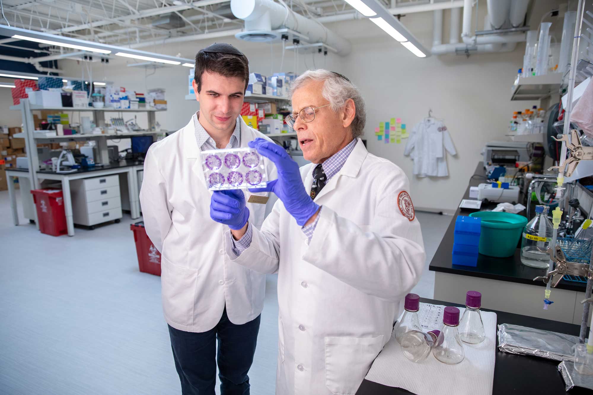 Moshe Serwatien learns from faculty member in NYMC medical lab