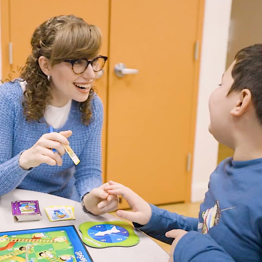 speech therapist working with child