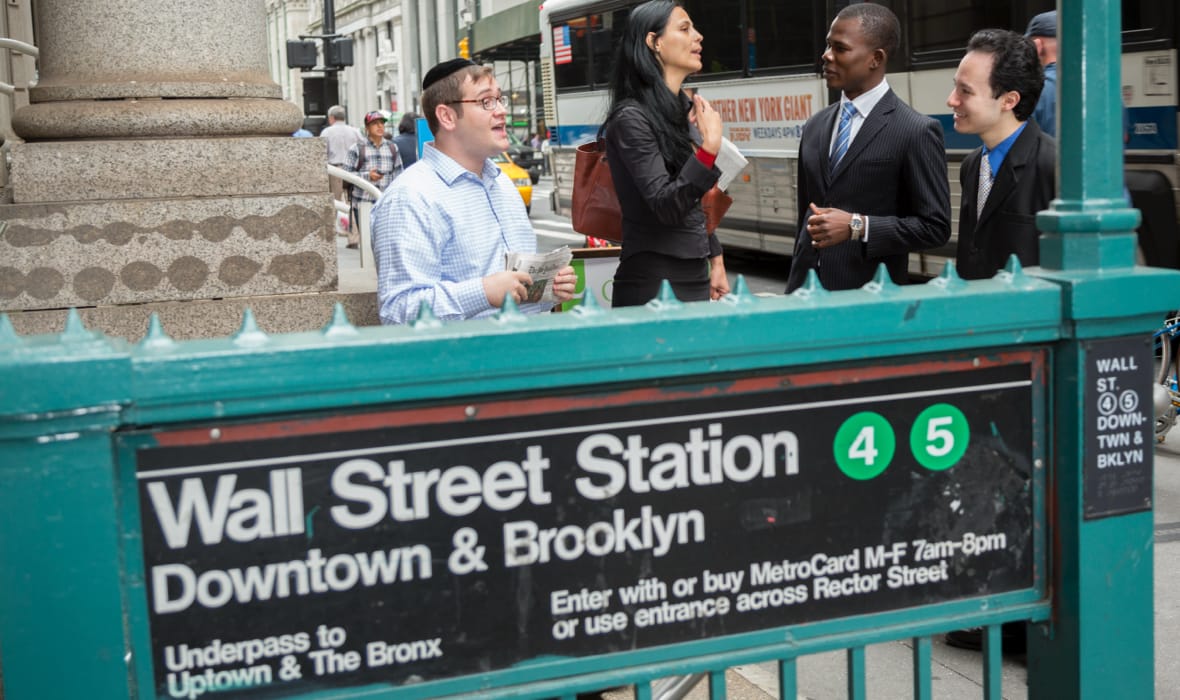 GSB students outside Wall street subway station