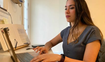 Touro Law student working on the covid helpline